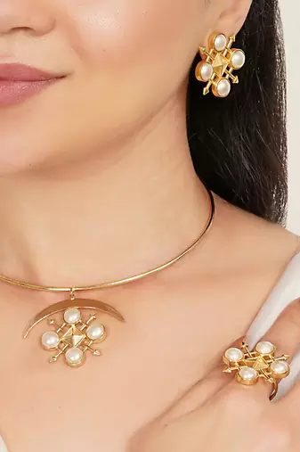 gold brass necklace set with pearl crescent design