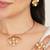 gold brass necklace set with pearl crescent design