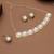 golden brass necklace set with halo pearl work