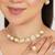 golden brass necklace set with halo pearl work