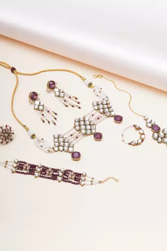 purple alloy necklace set with kundan bridal work