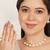 golden brass necklace set with halo pearl work