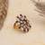 blush alloy ring with kundan floral design