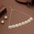 golden brass necklace set with pearl halo work