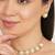 golden brass necklace set with pearl halo work