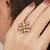 gold alloy ring with kundan pearl floral work