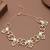 gold alloy necklace with pearl floral link design