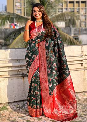 Dark green woven self design silk blend banarasi saree with blouse 1