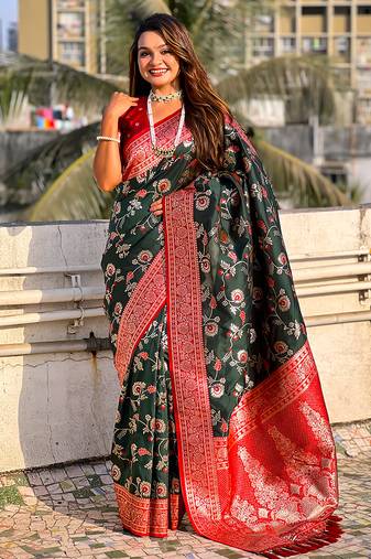 Dark green woven self design pure silk banarasi saree with blouse