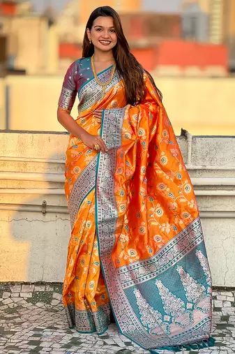Orange woven self design pure silk banarasi saree with blouse