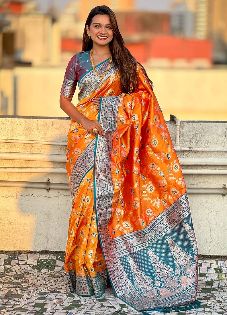 Orange woven self design pure silk banarasi saree with blouse
