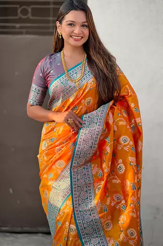 Orange woven self design pure silk banarasi saree with blouse