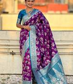 Purple woven self design pure silk banarasi saree with blouse