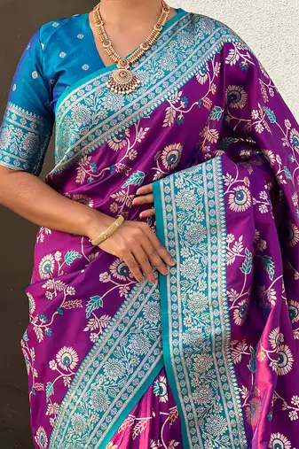 Purple woven self design pure silk banarasi saree with blouse