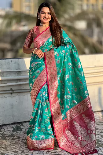 Teal green woven self design pure silk banarasi saree with blouse