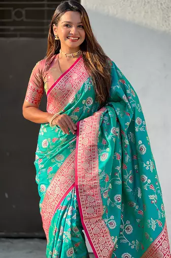 Teal green woven self design pure silk banarasi saree with blouse