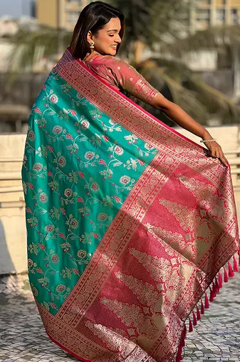 Teal green woven self design pure silk banarasi saree with blouse