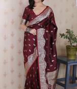 Maroon woven self design pure silk banarasi saree with blouse