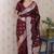 Maroon woven self design pure silk banarasi saree with blouse