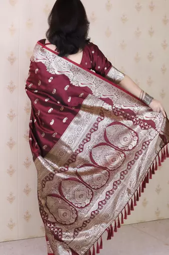 Maroon woven self design pure silk banarasi saree with blouse