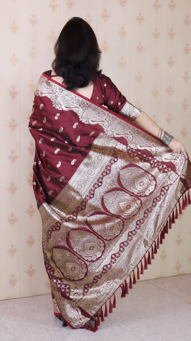Maroon woven self design pure silk banarasi saree with blouse
