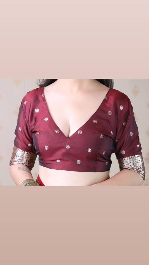 Maroon woven self design pure silk banarasi saree with blouse