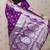 Purple woven self design pure silk banarasi saree with blouse