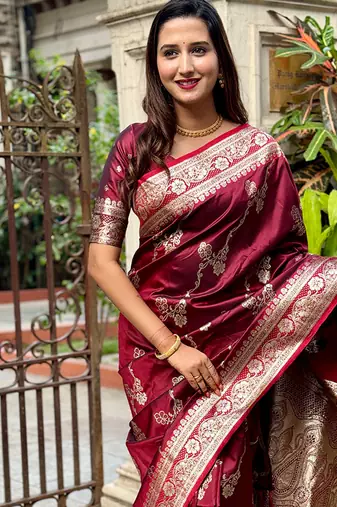 Maroon woven self design pure silk banarasi saree with blouse