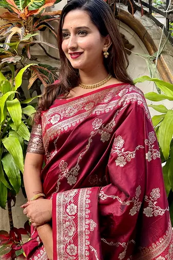 Maroon woven self design pure silk banarasi saree with blouse