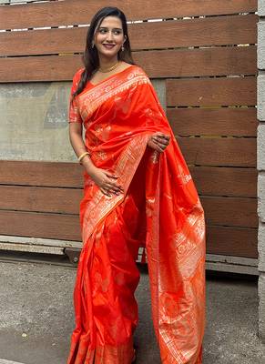 Orange woven self design silk blend banarasi saree with blouse 1