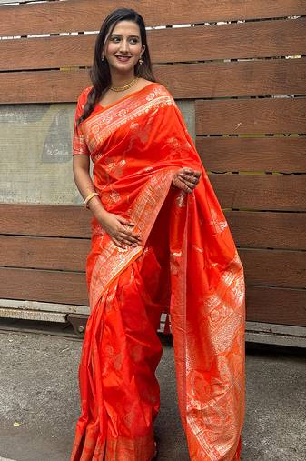 Orange woven self design pure silk banarasi saree with blouse