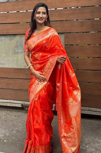 Orange woven self design pure silk banarasi saree with blouse