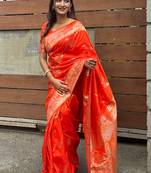 Orange woven self design pure silk banarasi saree with blouse