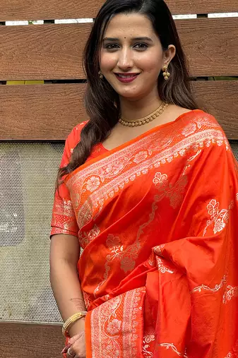 Orange woven self design pure silk banarasi saree with blouse