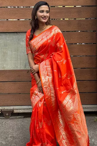Orange woven self design pure silk banarasi saree with blouse