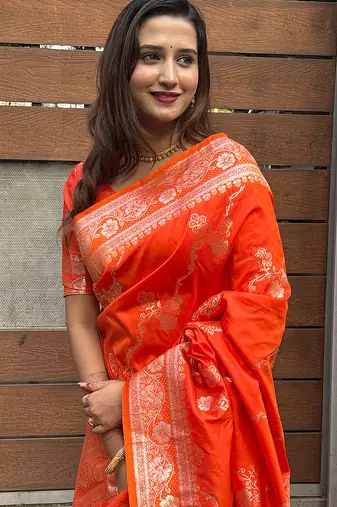 Orange woven self design pure silk banarasi saree with blouse