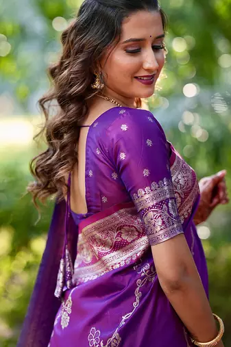 Purple woven self design pure silk banarasi saree with blouse