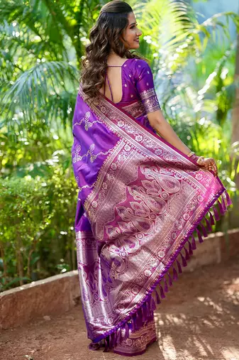 Purple woven self design pure silk banarasi saree with blouse