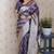 Lavender woven self design pure silk banarasi saree with blouse