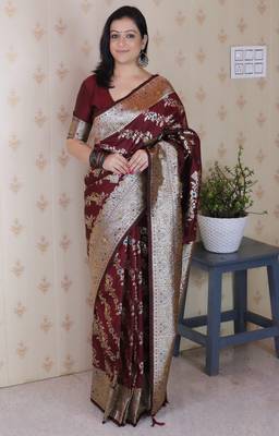 Maroon woven self design silk blend banarasi saree with blouse 1