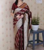 Maroon woven self design pure silk banarasi saree with blouse