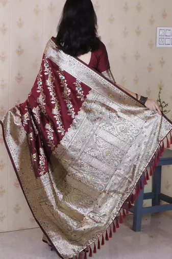 Maroon woven self design pure silk banarasi saree with blouse