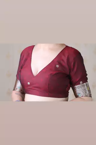 Maroon woven self design pure silk banarasi saree with blouse