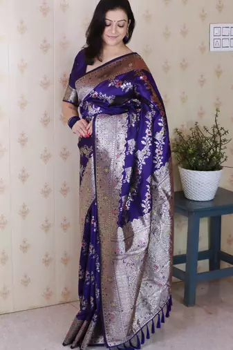 Violet woven self design pure silk banarasi saree with blouse