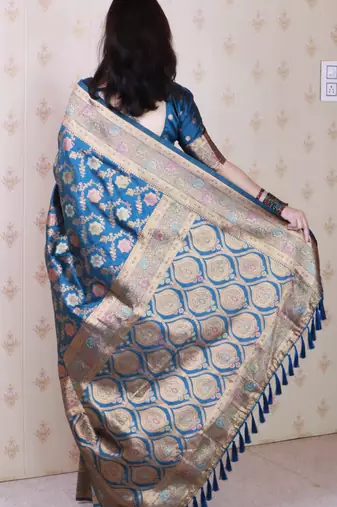 Blue woven self design pure silk banarasi saree with blouse