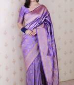 Lavender woven self design pure silk banarasi saree with blouse