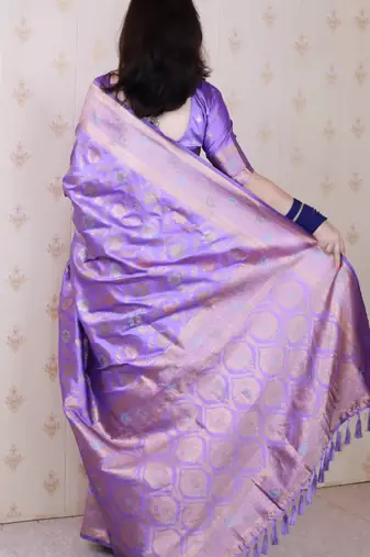 Lavender woven self design pure silk banarasi saree with blouse