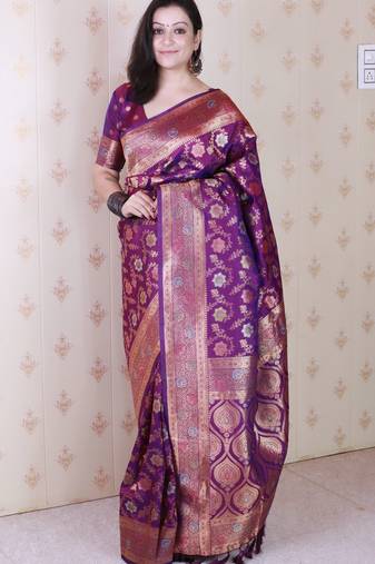 Purple woven self design pure silk banarasi saree with blouse