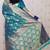 Teal green woven self design pure silk banarasi saree with blouse