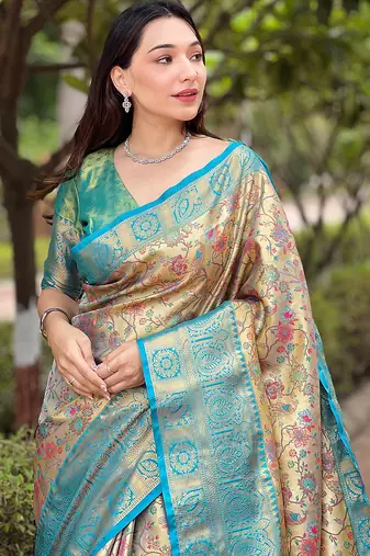Sky blue woven self design embellished pure silk saree with blouse